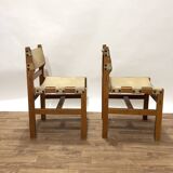 Pair of Maison Regain leather chairs