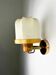 Italian articulated "Cocoon" wall light, resin and pine, 1970s