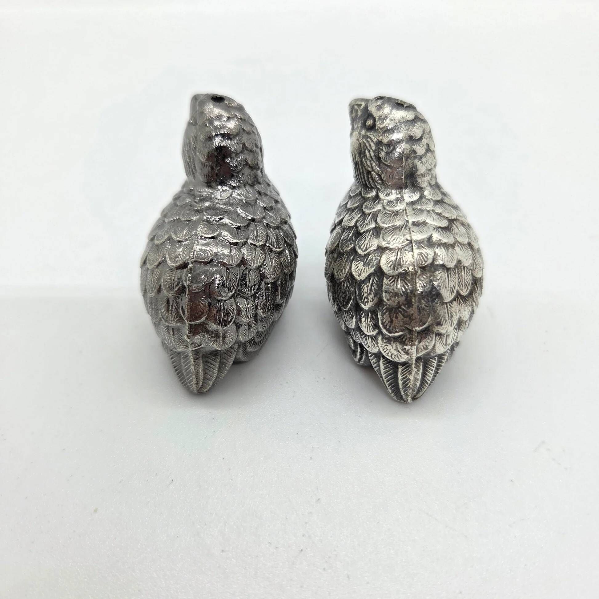 Pair of silver-plated metal bird salt and pepper shakers