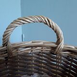 Very large round basket in two-tone braided wicker with handles