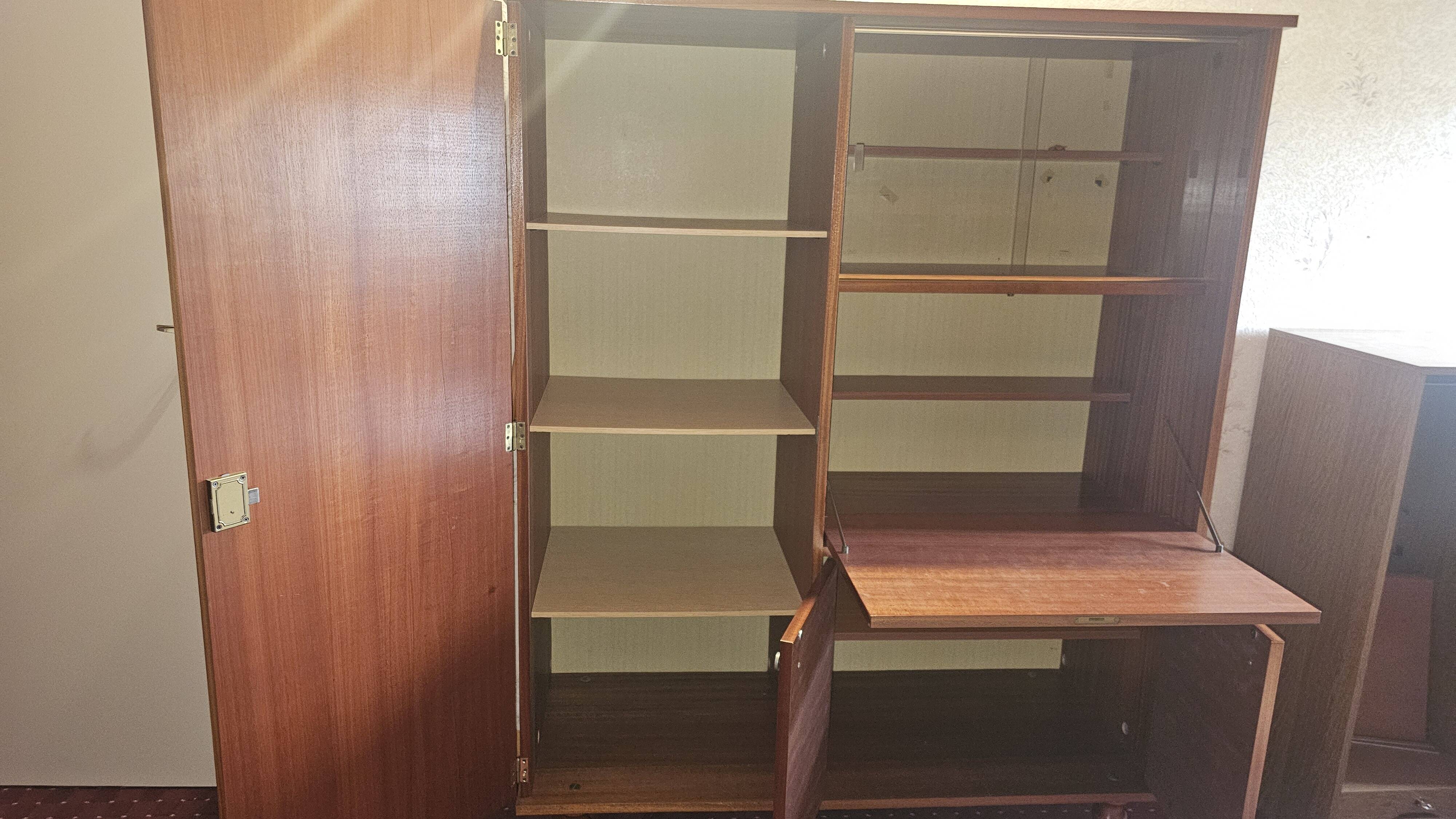 1960s teak veneer secretary with sliding display cabinet.