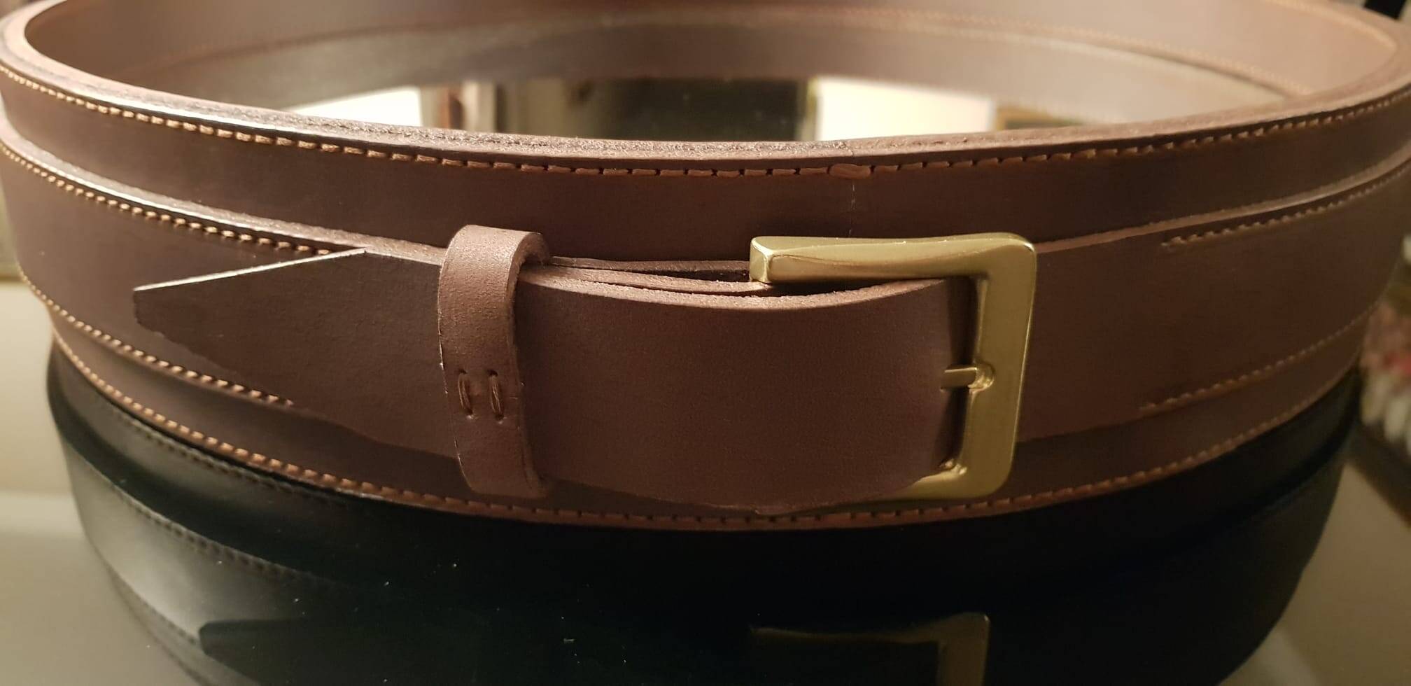 Handmade J. Adnet style mirror in brown vegetable-tanned leather, ø 58 cm