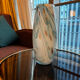 Blown glass vase marbled in white, water green, and with golden inclusions –