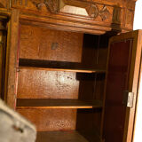 Lion's head oak shelf cabinet