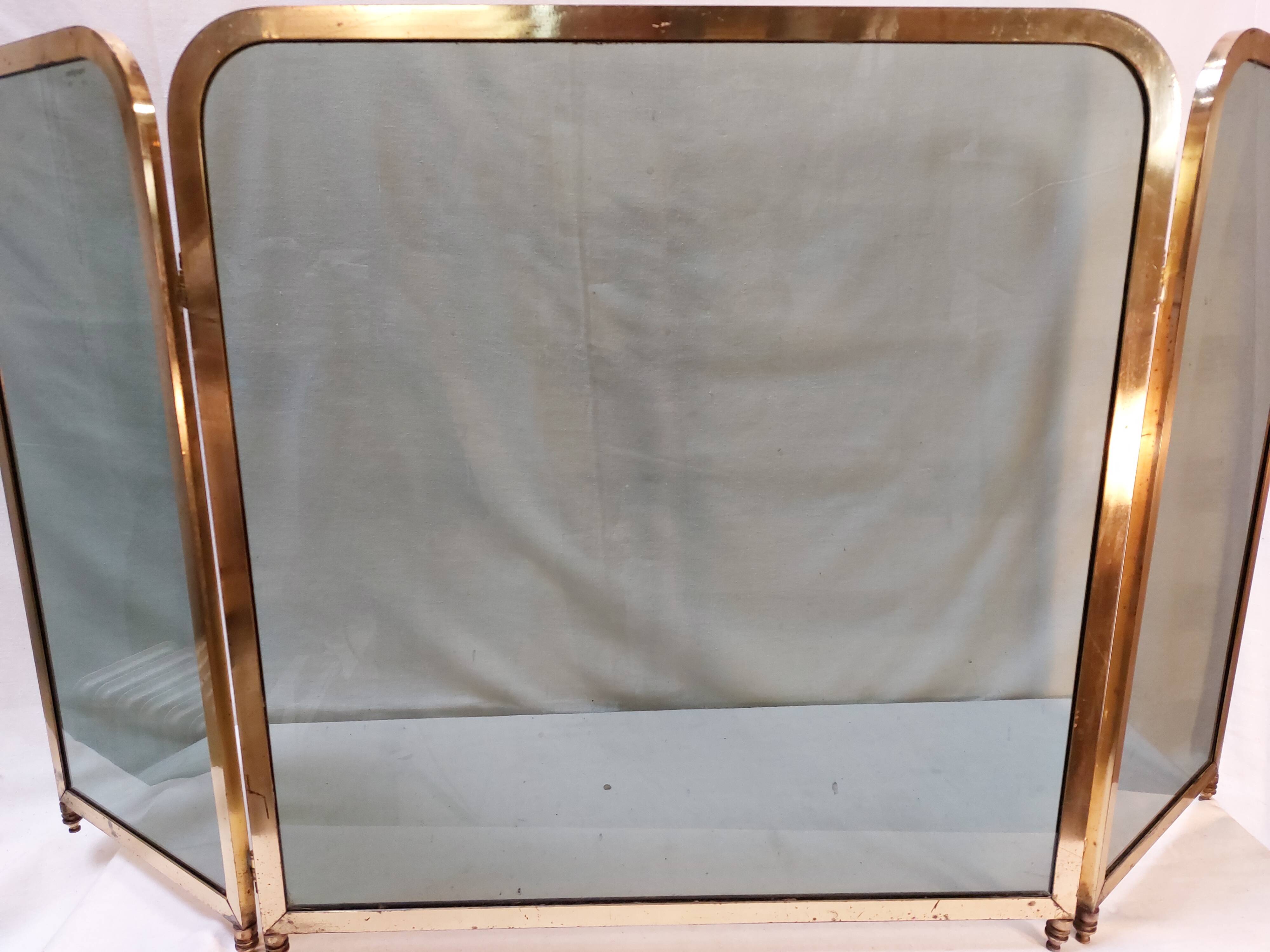 Vintage fireplace screen in smoked glass and gold-tone metal