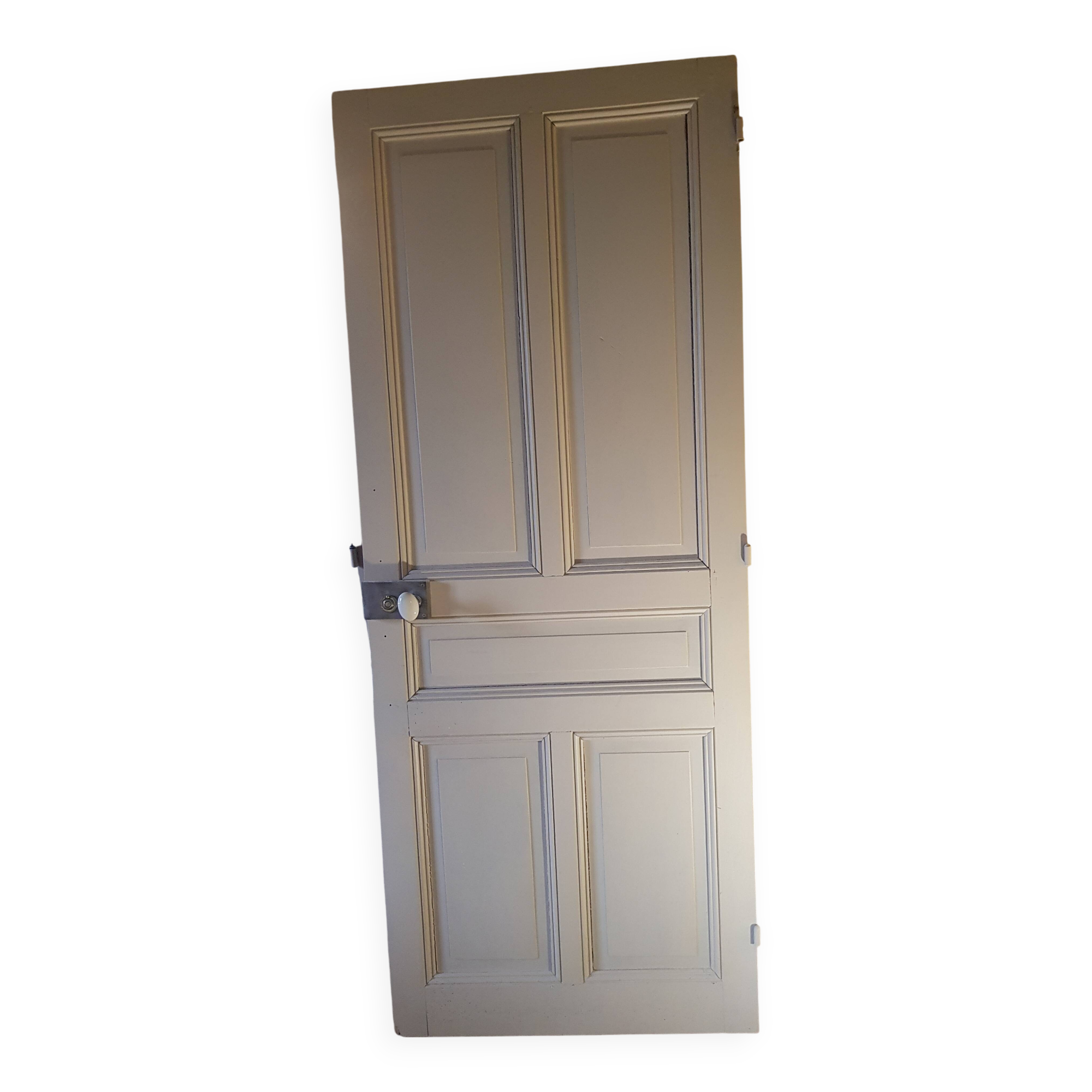 Large painted oak interior door with its hinges