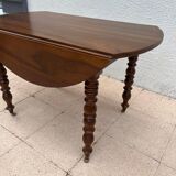 Table ronde en noyer