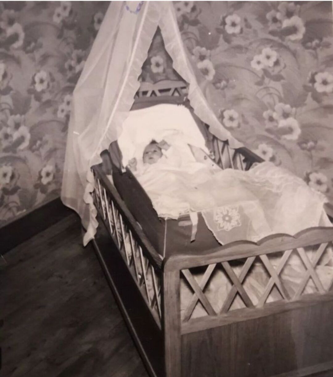 Vintage wooden baby cot from the 1960s.