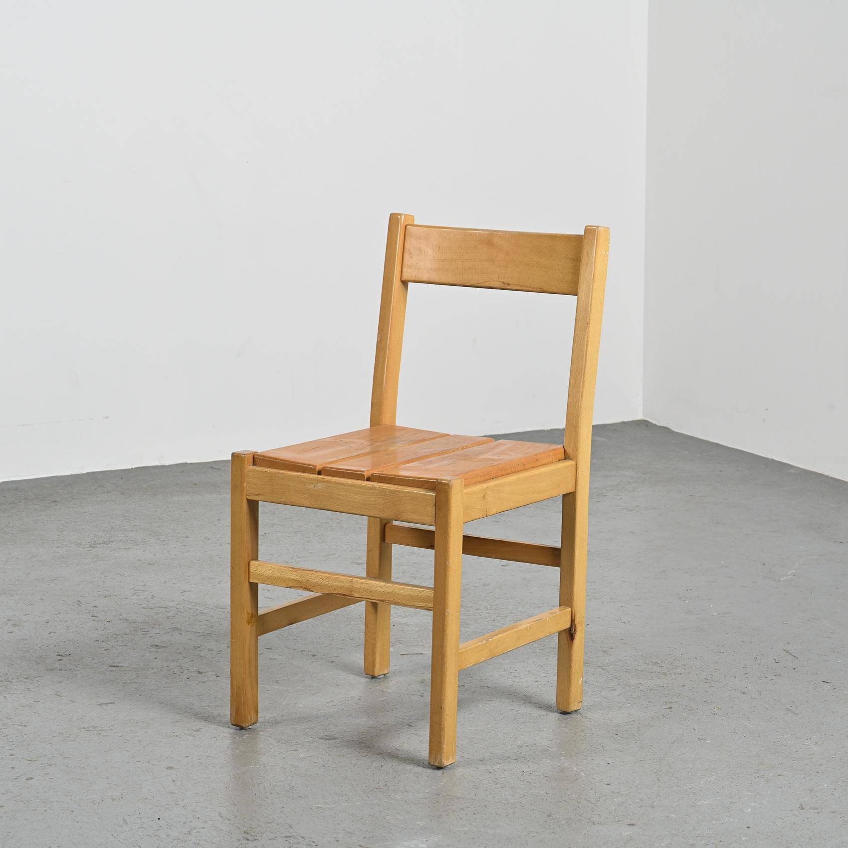 Suite of four chairs in the style of Maison Regain