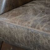 Very comfortable vintage cow leather armchair with character