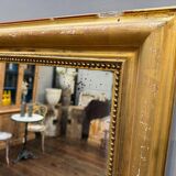 Old gilded fireplace mirror