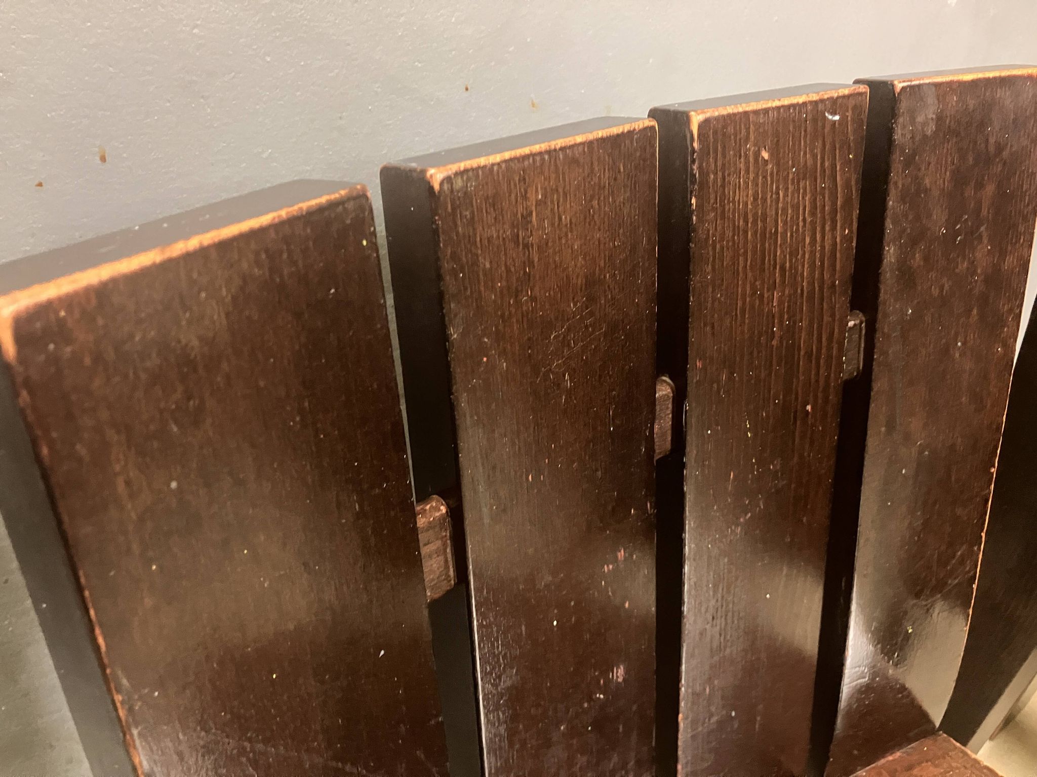 Brutalist and modernist dining chairs from the 1970s in architectural brown wood.