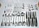 Ercuis trianon silver-plated cutlery set – 42-piece tableware with crossed ribbon design