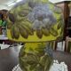 Table lamp in multilayer glass paste, adorned with a rich floral decoration.