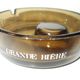 Stella Artois advertising ashtray in smoked glass color