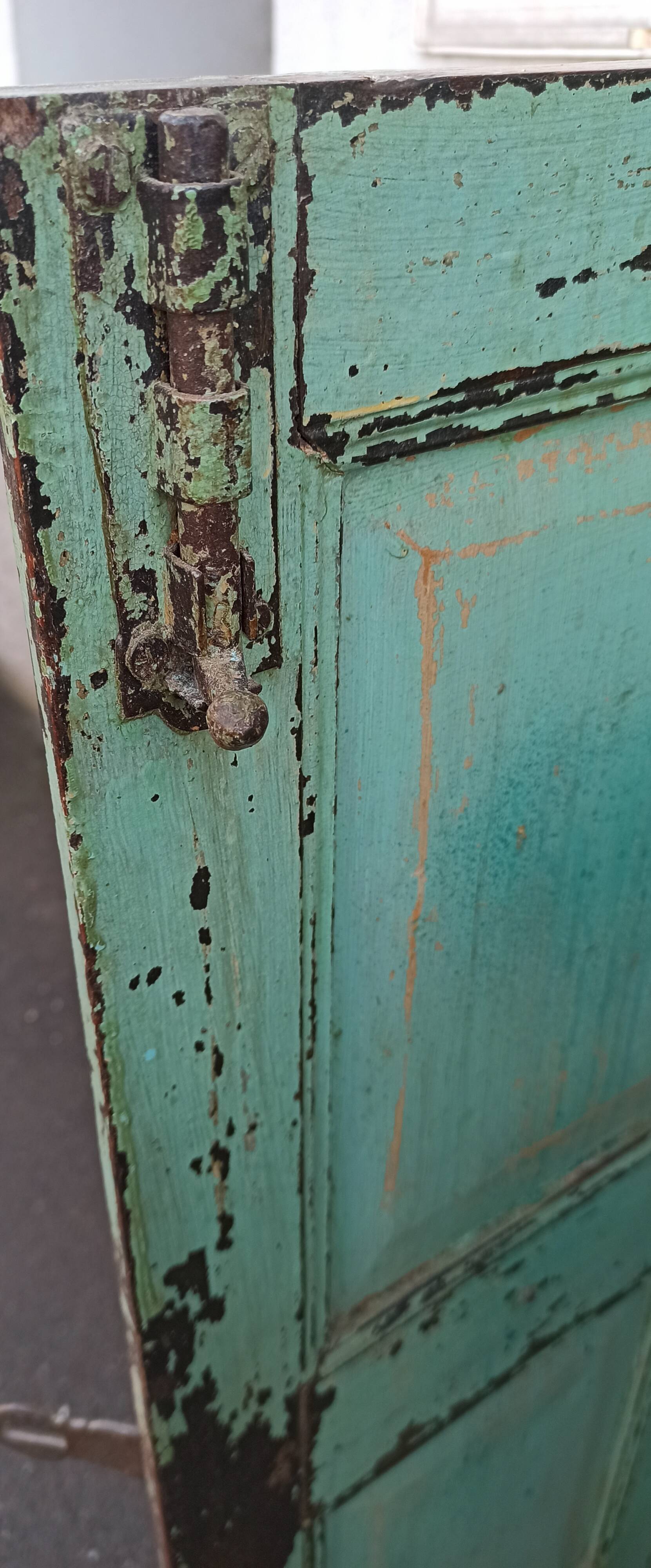 Old wooden cabinet with beautiful green patina