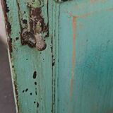 Old wooden cabinet with beautiful green patina