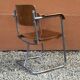 Fauteuil moderniste en multiplex, tubes acier vissés