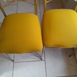 Pair of vintage golden designer chairs from the 50s