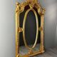 Large Louis XV style mirror in carved and gilded wood, 19th century