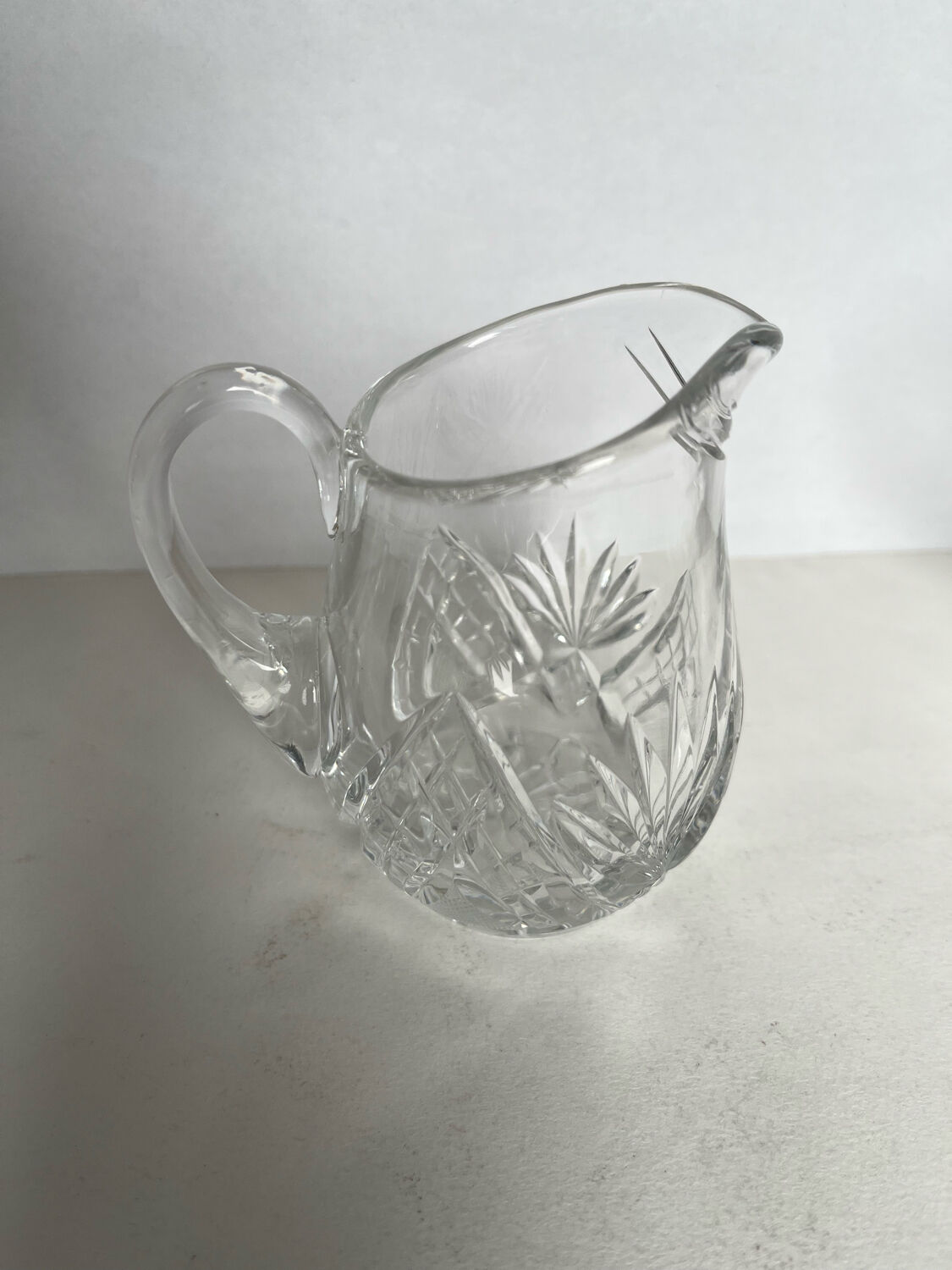 2 crystal pitchers