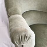 sage green toad armchairs with gold fringe