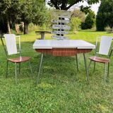White Formica table with extensions and 2 designer chairs
