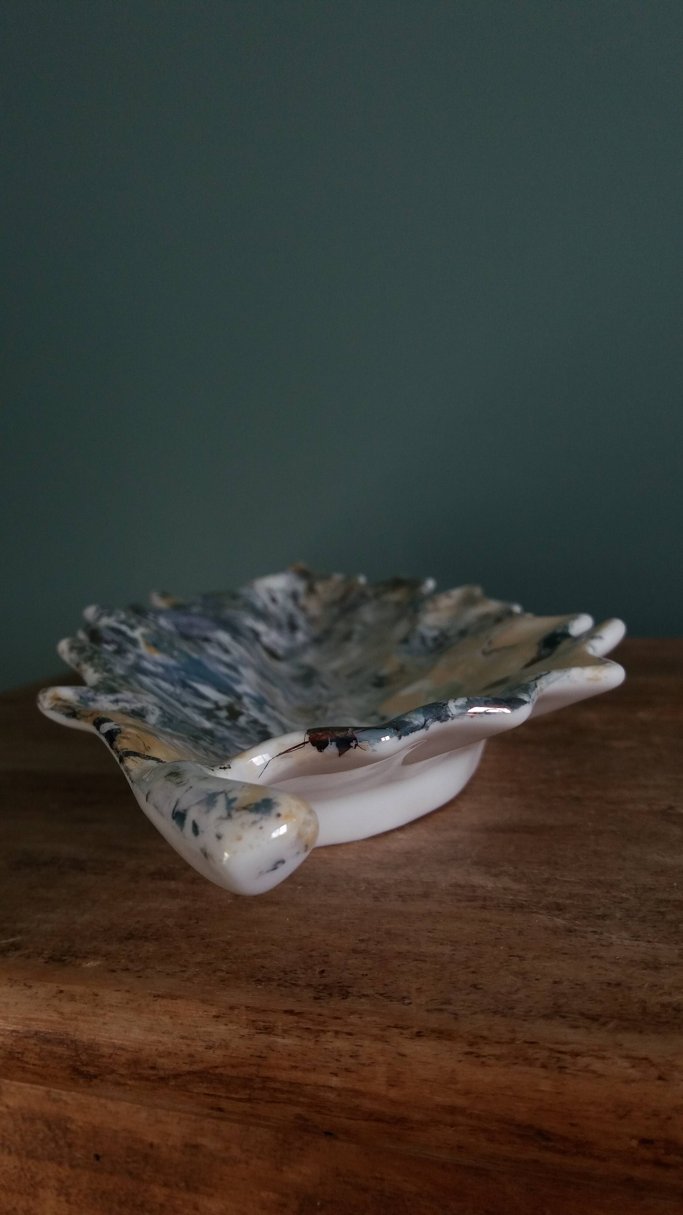 Iridescent enamelled leaf catchall, signed Gfredy.