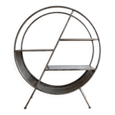 Round shelf on a stand in industrial style made of steel.