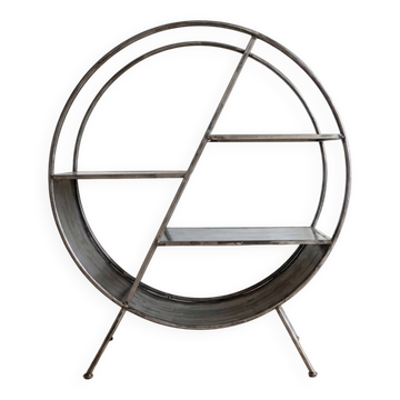 Round shelf on a stand in industrial style made of steel.