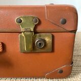 Antique suitcase and its key
