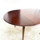 Danish round dining table in rosewood – 1950s design with butterfly extension.