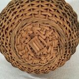 Wicker basket with a wooden bead border