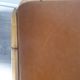 Rattan coffee table with brown leather top 63 cm side 39 cm high