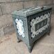 Enamelled cast iron wood stove and earthenware Mirus