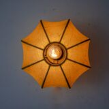 “Cocoon” wall lamp, resin and pine, Italy, 1970