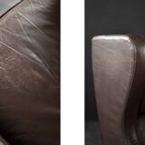 Brown leather wingback chair in mid-century modern Danish style, 1960s.