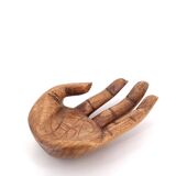 Empty wooden pocket in the shape of a hand, vintage