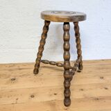Turned wooden tripod stool