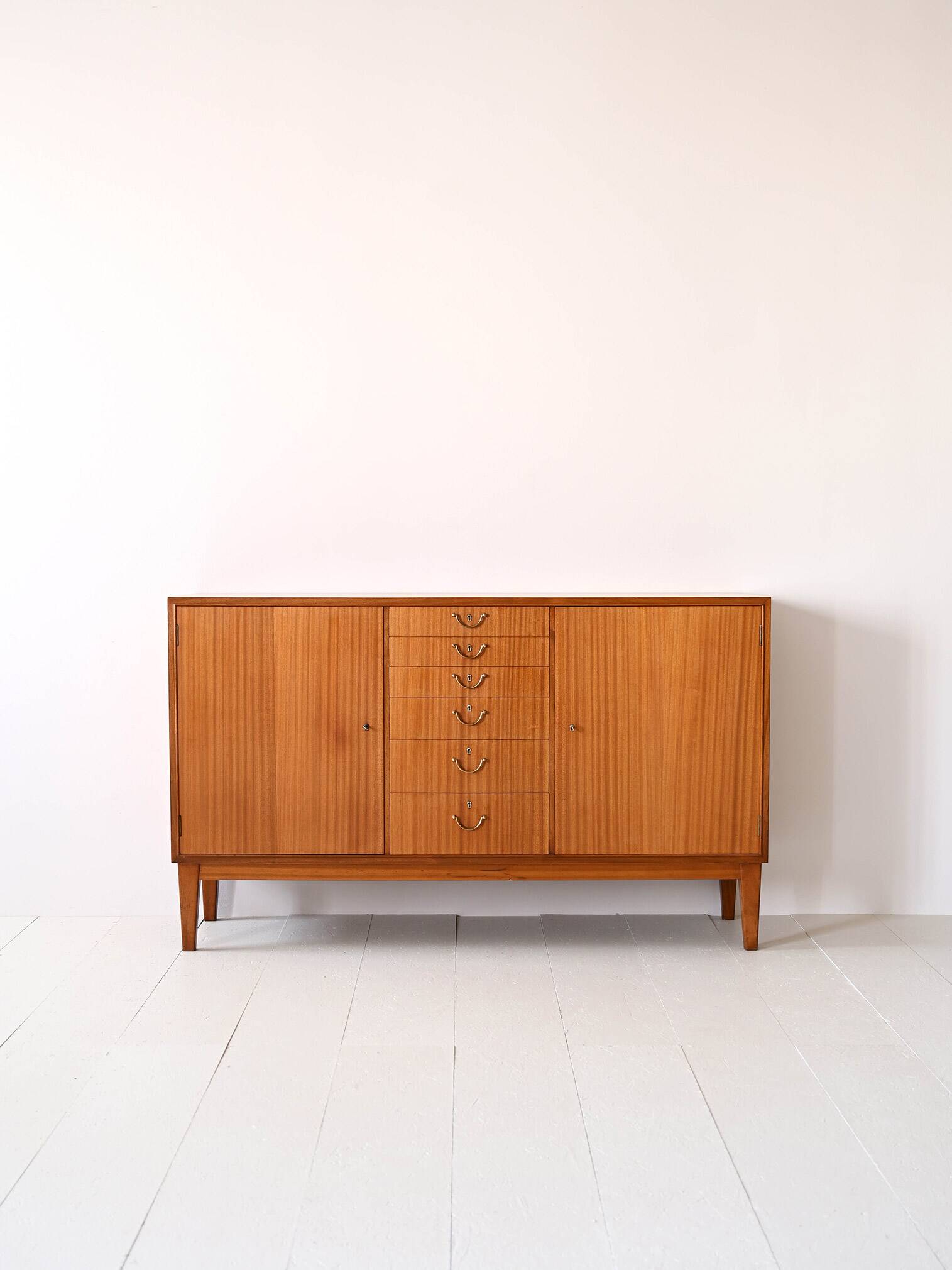 Scandinavian high sideboard with central drawers