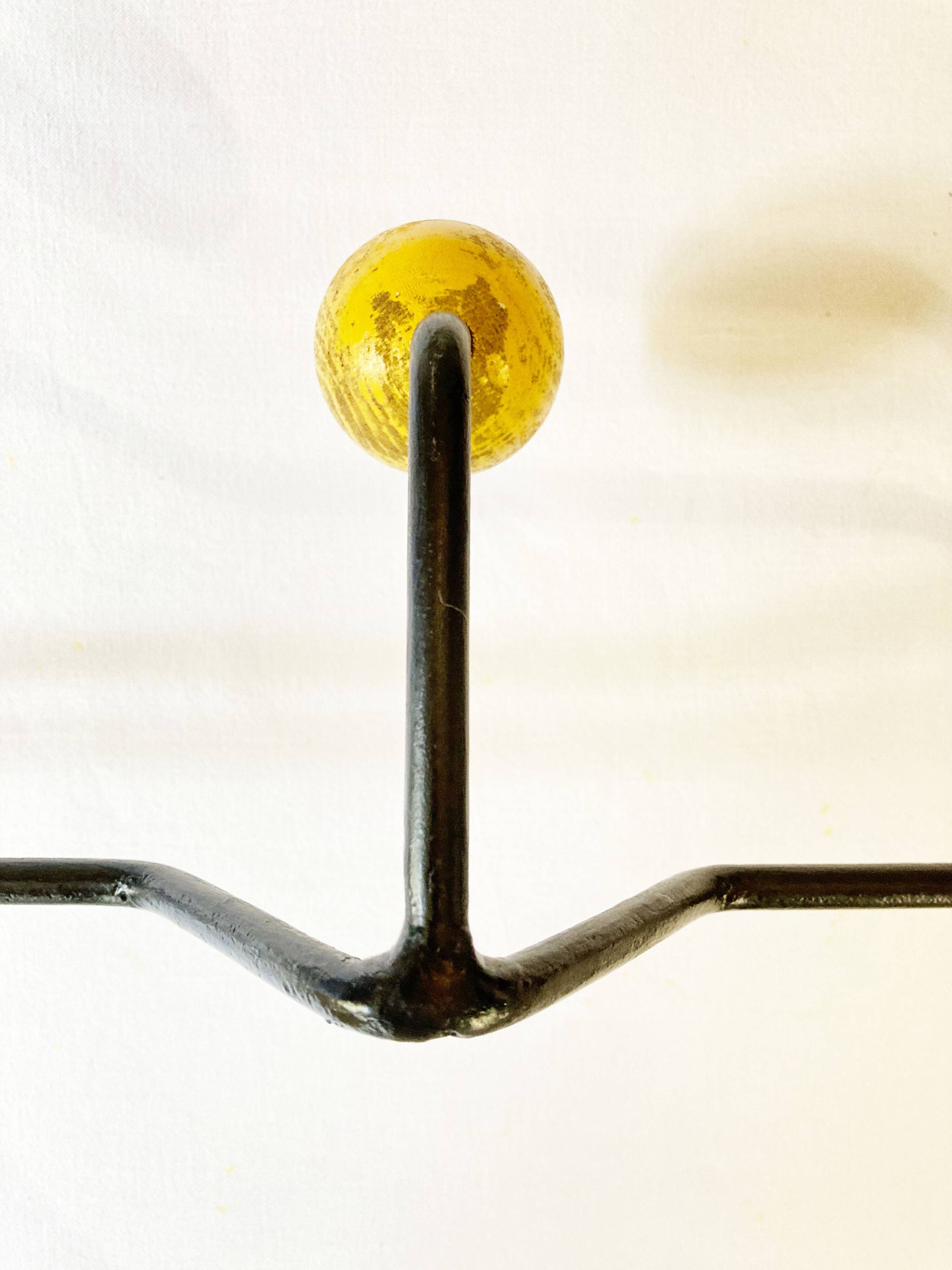 Seventies coat rack/coat hook, green-yellow-red metal and wood