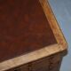 Antique Victorian oak kneehole desk with 18 double-sided drawers.