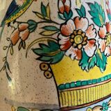 Old ceramic pitcher (18th century?) decorated with polychrome exotic birds