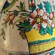 Old ceramic pitcher (18th century?) decorated with polychrome exotic birds