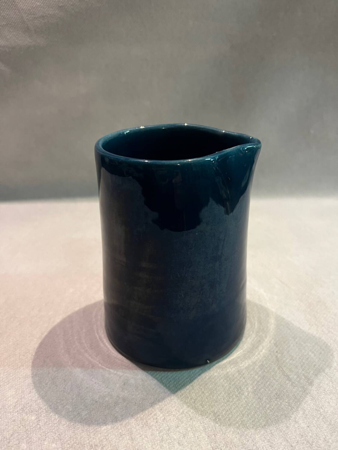 Blue ceramic milk jug