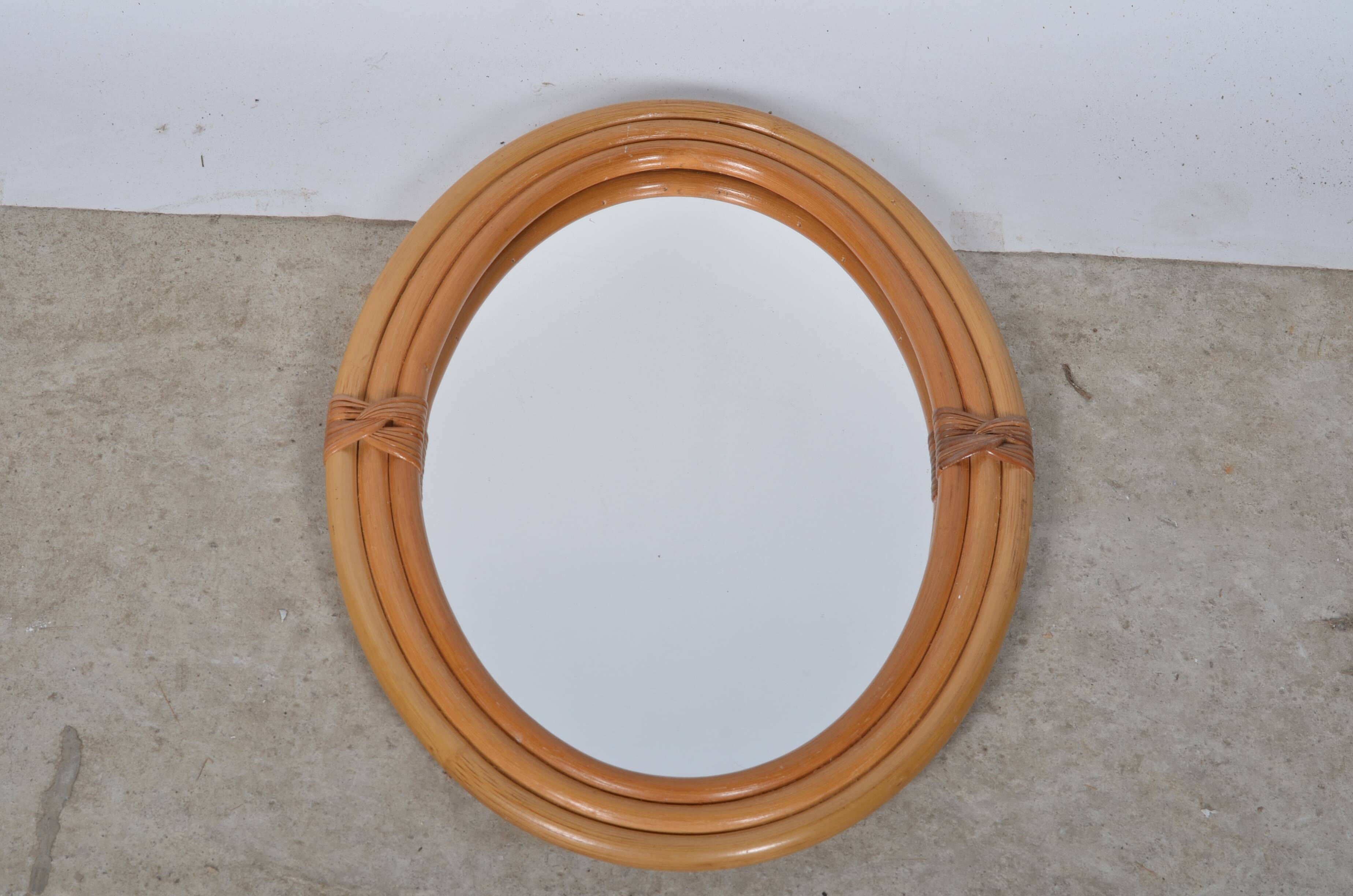 Oval rattan mirror
