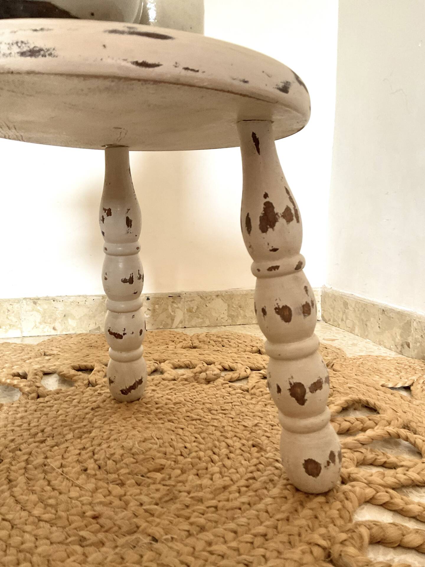 Patinated tripod stool
