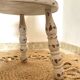 Patinated tripod stool