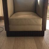 Two armchairs and an Art Deco style pouf
