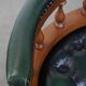Elegant green English chesterfield office chair made of cowhide leather